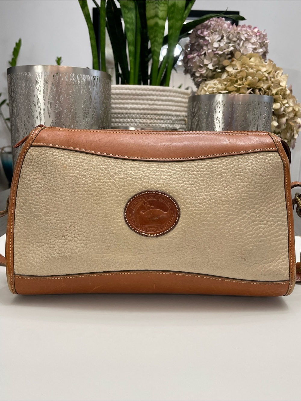 Dooney & Bourke Cream Leather Shoulder Bag with Brown Trim